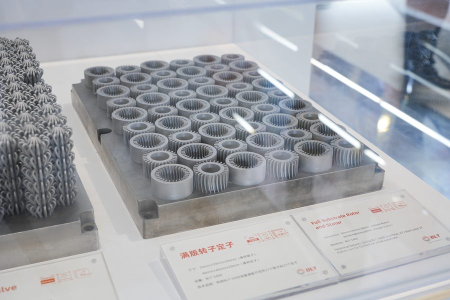 Full-substrate nest of metal additive rotor and stator blanks in a display case